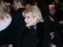 Joan Rivers stops to talk to the press before the curtain rises Photo
