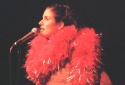 What would a solo show or an "evening" be without a feather boa?  Photo