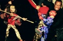 Shanon Stoeke and Kevyn Morrow manipulate the Monkey King and Demon puppets in a batt Photo