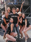 Hunter Foster right at home with the ladies
of The Producers Photo