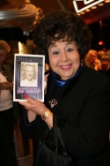 Jane Withers displays the evening's tribute program Photo