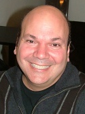 Casey Nicholaw is all smiles! Photo