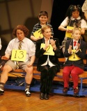 Cast and spellers, including (from bottom row) Jared Gertner, Julie Andrews, Sarah Sa Photo