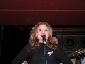 Lori Ann Strunk singing "Every Little Thing" Photo