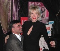 
Lawrence gives Gennifer a lift...  Photo