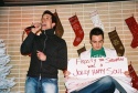 John Tartaglia singing Frosty the Snowman with Scott's assistance holding up cue card Photo