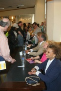 Leslie Uggams, Julie Budd and "Let's Put on a Show" participants sign CDs Photo