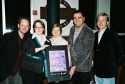  Jamie McGonnigal and Michele Helberg (Co-Producer) presenting Judy Shepard with a si Photo