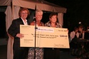 Marti Heinbaugh of Mission Valley Bank presents check to Mark Salyer and Andrea Slomi Photo