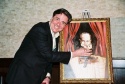 Gary Beach posing with the painting  Photo