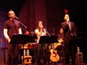 Adam Pascal, Lea Michele and Greg Naughton in the opening number, "Sing."
 Photo