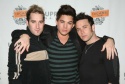 Adam Lambert flanked by friends Photo