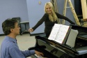 Rob Fisher (at Piano) and Kristin Chenoweth in rehearsals for the Encores! production Photo