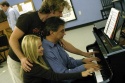 (Clockwise from left) Kristin Chenoweth and Malcolm Gets join Music Director Rob Fish Photo