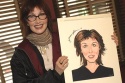 Joanna and her caricature Photo