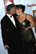 John Patrick Shanley kisses his leading lady Cherry Jones for the cameras Photo