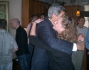 John Kerry embracing Kathleen Turner Photo