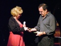 Mandy Patinkin jumps on stage to offer her $140... Photo