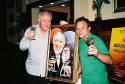 Norbert Leo Butz joining John Lithgow for a toast  Photo