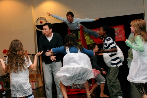 Patrick Page (center), Rusty Ross (background) and The Who children Photo