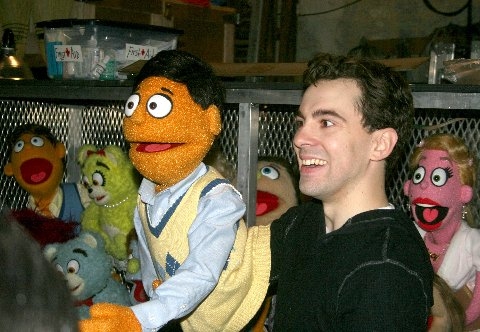 Robert McClure demonstrates puppet handling backstage after the show with Princeton Photo