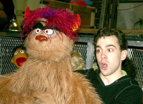 Robert McClure demonstrates puppet handling backstage after the show with Trekkie Mon Photo