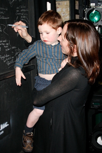 Molly Shannon and son Nolan Shannon Chestnut sign the special-guest wall Photo