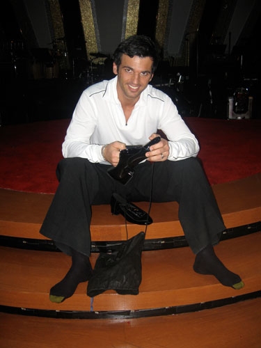 Tony Dovolani getting ready with his new shoes! Lets dance Photo