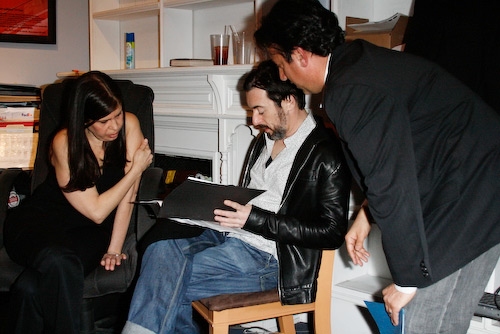 Dayle Reyfel and Eugene Pack go over a scene with Alan Cumming Photo