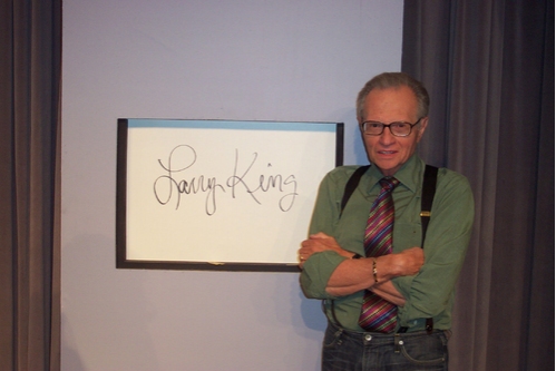 Larry King Signs in Photo
