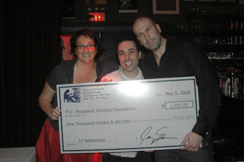 Annette Tanner and David Petro receive donation check for the Broadway Dreams Foundat Photo