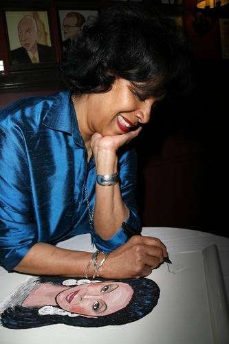 Phylicia Rashad with her caricature
 Photo