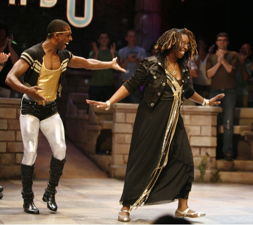 Whoopi Goldberg with cast member Andre Ward 
 Photo