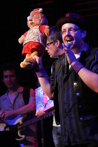 Jamie McGonnigal auctions off a Teddy Ruxpin signed by 100s of Broadway Stars Photo
