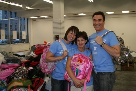 Photo Flash: Patrick Page and Paige Davis Volunteer at Operation Backpack Image