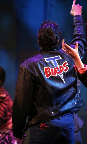 Ace Young shows off the T-Birds jacket Photo