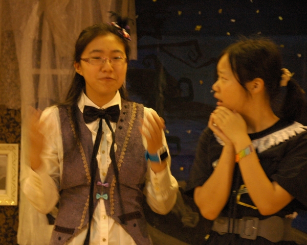 Fiona Wei as Professor Plum and Cissy Shen as Nancy Drew Photo