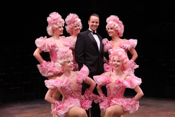 Noah Racey as Bobby Child surrounded by ensemble (right, clockwise) Robin Masella, Kr Photo