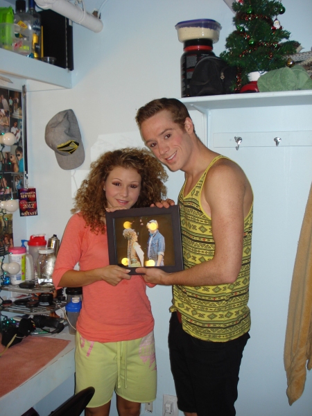  Josephine Rose Roberts and Cody pose with a picture of them taken during Toronto run Photo