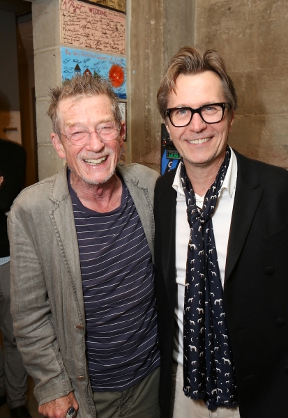 From left, cast member John Hurt and actor Gary Oldman pose backstage after the openi Photo