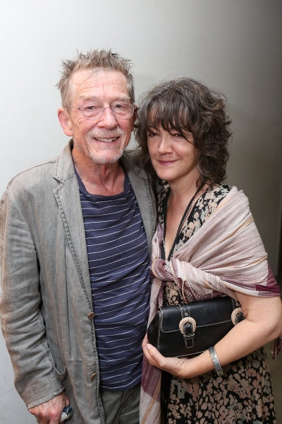 From left, cast member John Hurt and wife Anwen Rees-Myers pose backstage after the o Photo