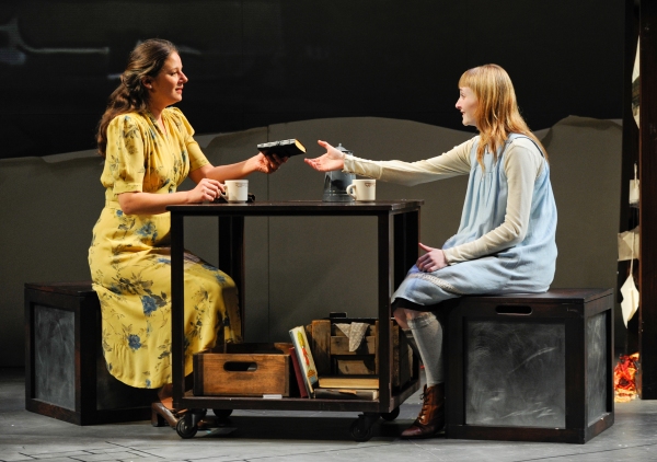 Ilsa (Nicole Wiesner) gives a blank book to Liesel (Rae Gray) Photo