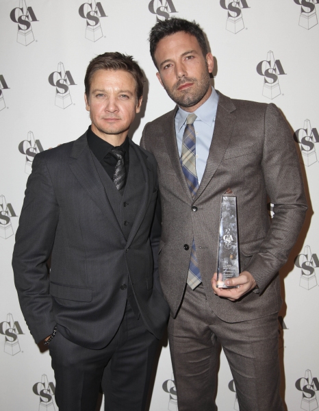 From left, actors Jeremy Renner and Ben Affleck, Career Achievement Award winner, pos Photo