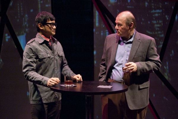 Hiro (Kroydell Galima, left) and Edmund Hewlett (Craig Spidle) talk business over dri Photo