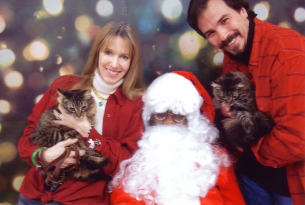 Kevin Gray and Dodie Petitt with Santa and their children Photo