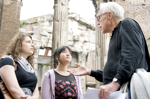 Caroline Durlacher, Sharon Jan & John Guare discuss Roman theater outside the Teatro  Photo