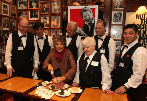 Dena Kaye (center) cuts the first Danny Kaye Deli Club to commemorate Danny Kaye's Ce Photo