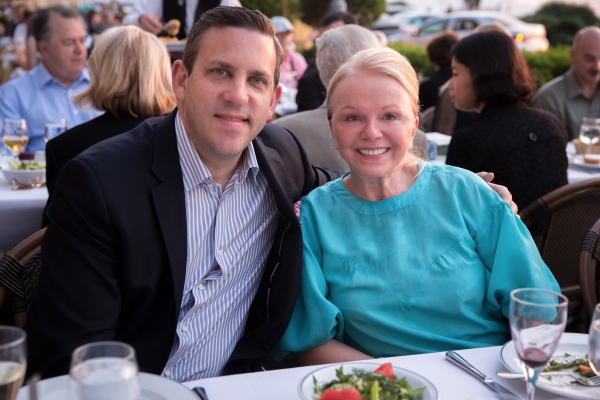 Matthew VanBesien with board member Lizabeth A. Newman at patron dinner, 7:50pm, 5/1/ Photo