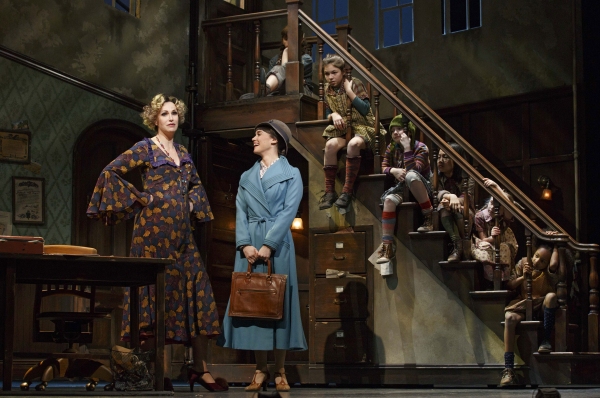 Jane Lynch as Miss Hannigan, Brynn O''Malley as Grace Farrell, with (l-r on stairs) G Photo