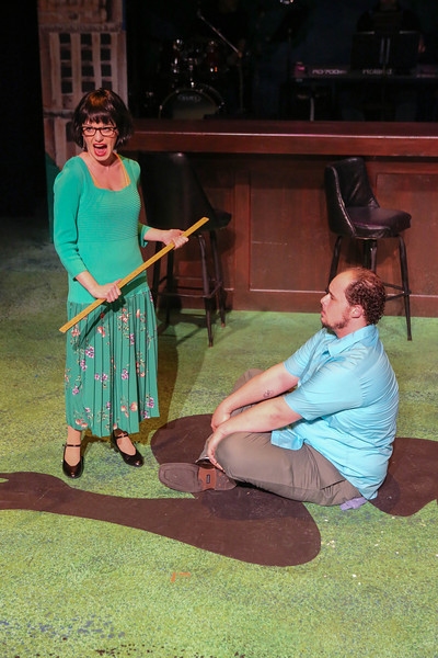 Chrissy Young as an abusive teacher and Zachary Allen Farmer as a young Charles Bukow Photo